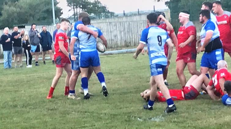 Sion Colella (No 7) scores on of his three tries for Fishguard